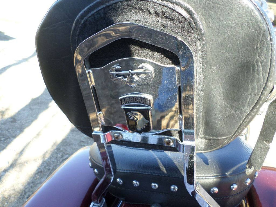 Airborne and air assault decal on the rear of a motorcycle seat