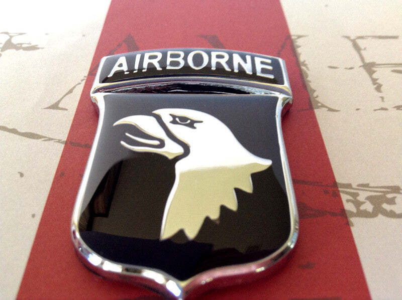 Airborne emblem with an eagle design on a red background