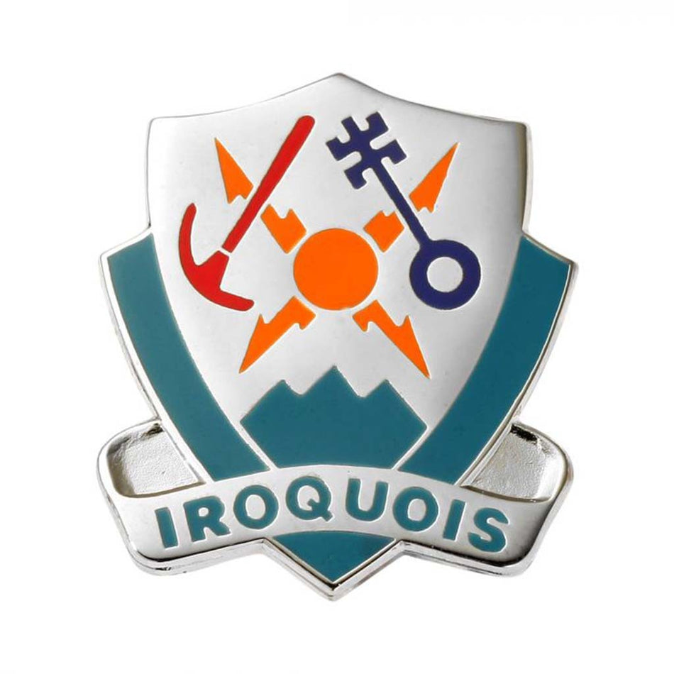 A shield-shaped enamel pin with the word 'IROQUOIS' on a banner at the bottom. The design features a silver-toned border, teal blue side panels, a teal center, an orange sun, orange lightning bolts, a red anchor, and a dark blue key on a white background.