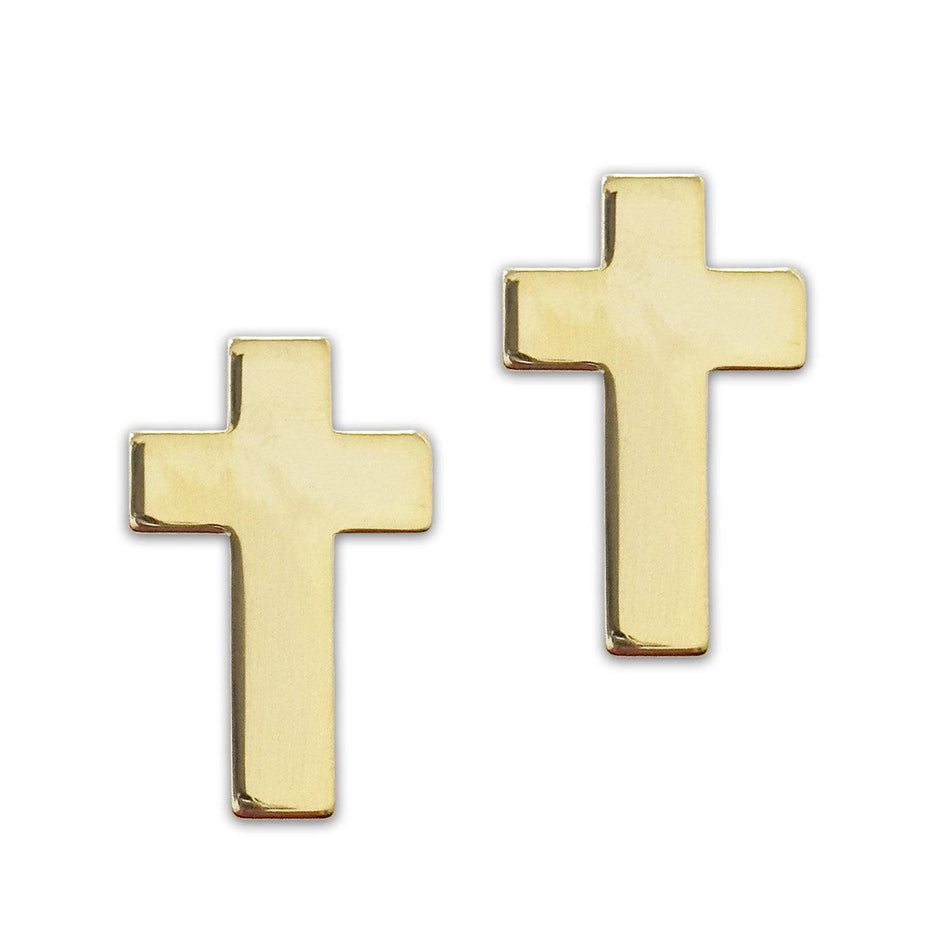 Gold cross earrings on a white background