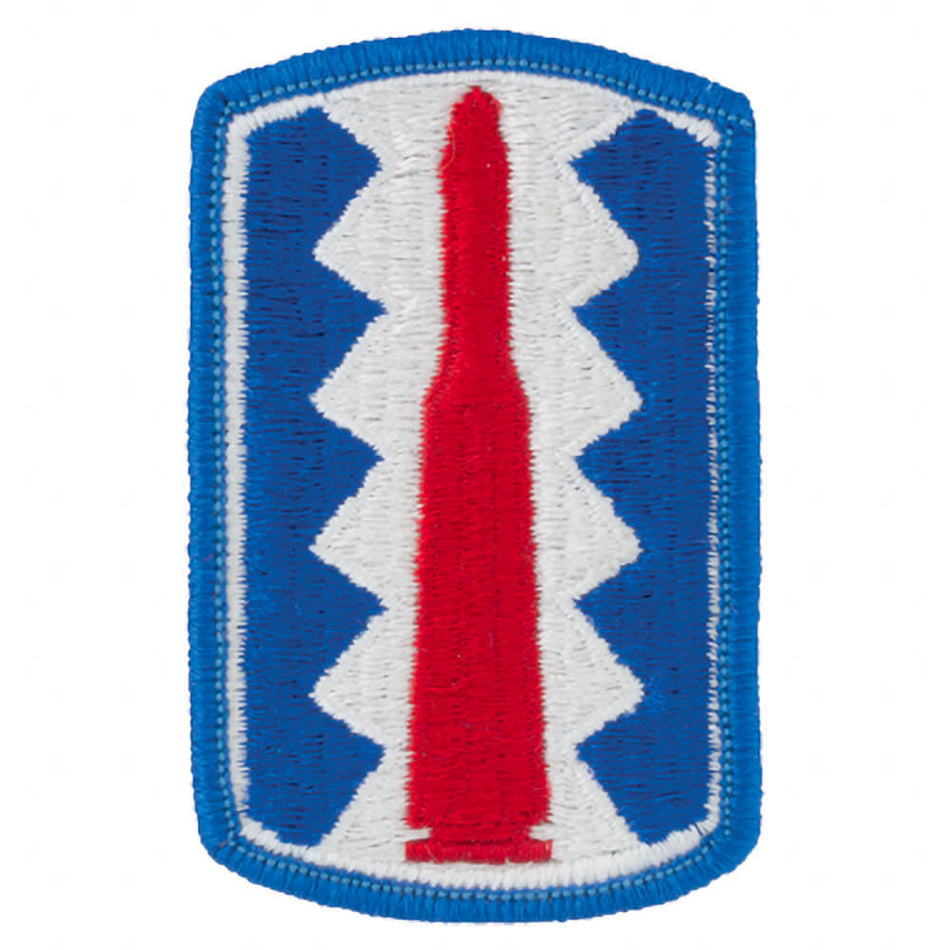 197th Infantry Brigade Full Color Army Patch an embroidered patch featuring a red vertical element centered on a white background, flanked by blue zigzag shapes and bordered in blue.