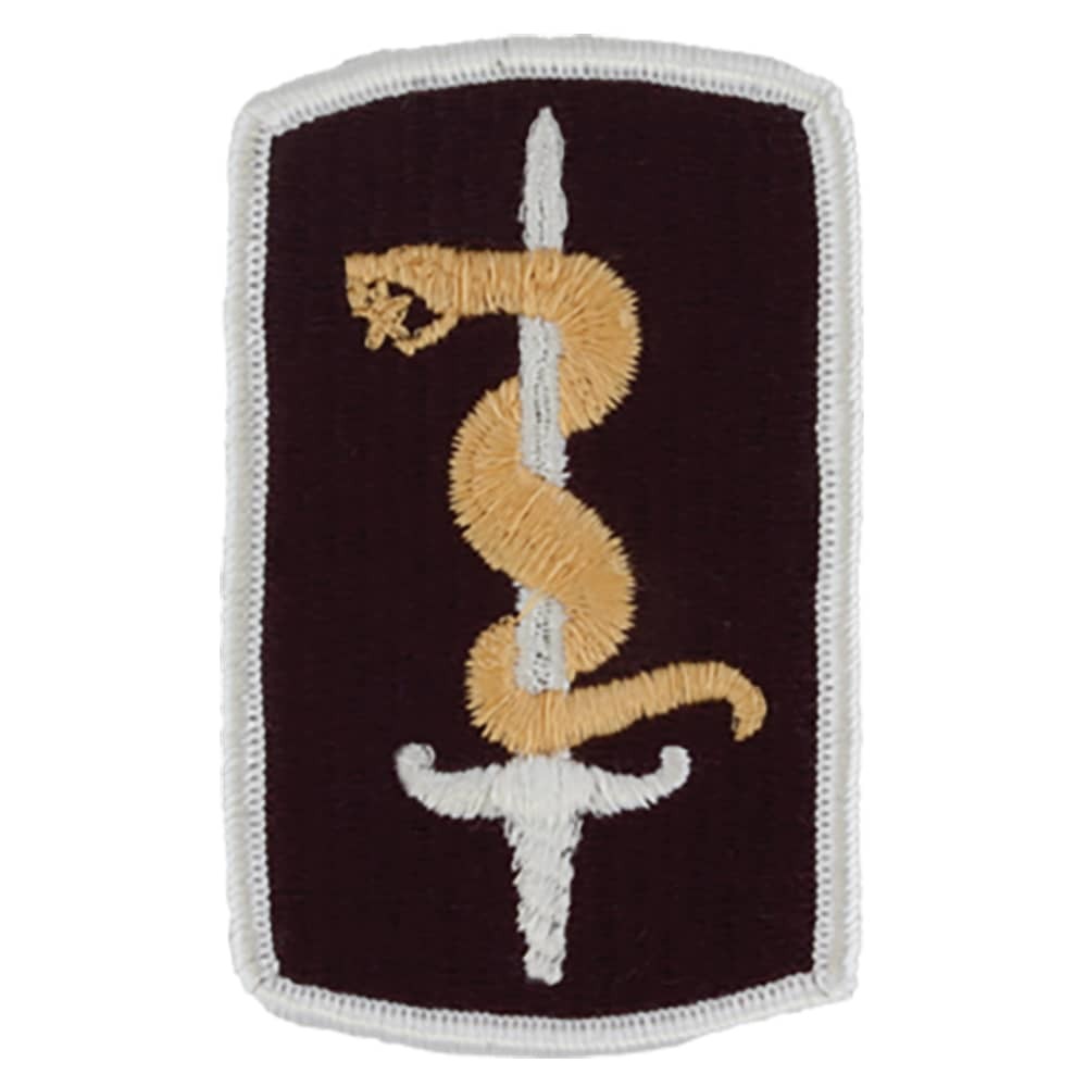 An embroidered military-style patch featuring a gold snake wrapped around a white sword on a dark maroon background, finished with a white stitched border.