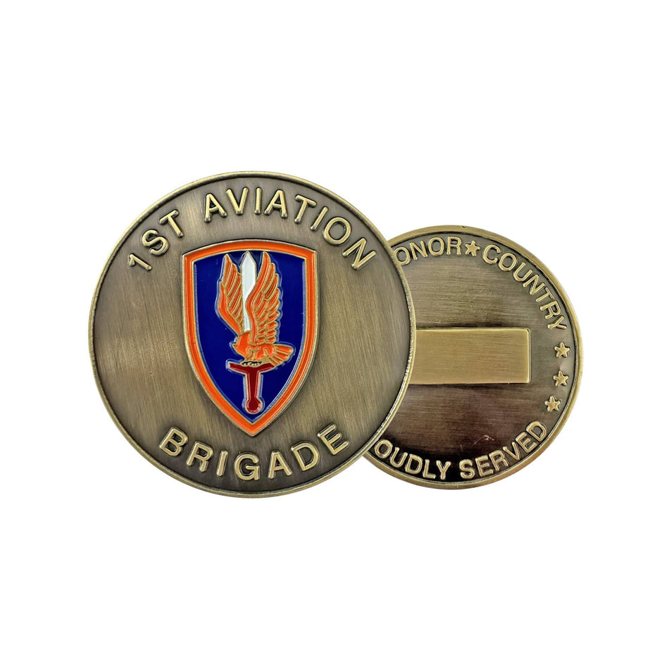 Bronze military coin with '1st Aviation Brigade' text and emblem on a white background