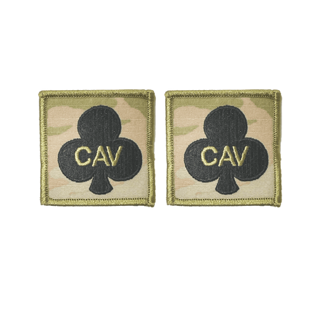 Two military patches with 'CAV' text on a white background