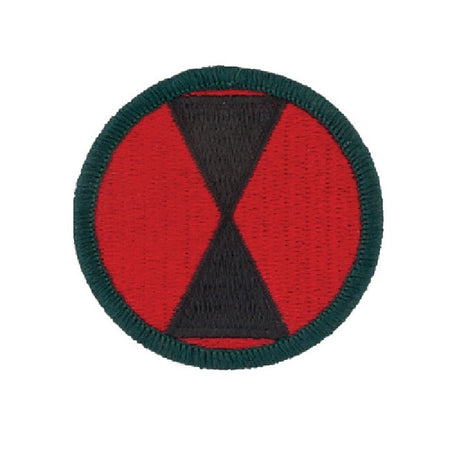 A circular embroidered patch featuring a red background with a black inverted V-shape in the center and a dark green stitched border.