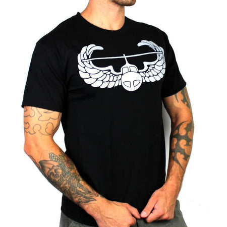 Black t-shirt with a white graphic design on a plain background