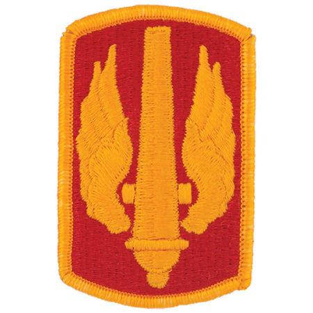 18th Field Artillery Brigade Color Army Patch an embroidered military-style patch featuring a red shield shape with a yellow border, a central yellow vertical element, and two yellow wings on each side, shown on a plain white background.