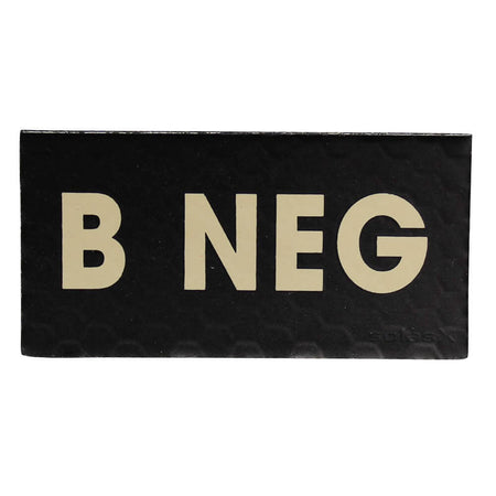A rectangular black plaque or sign with the words 'B NEG' printed in large beige capital letters, shown against a plain white background.