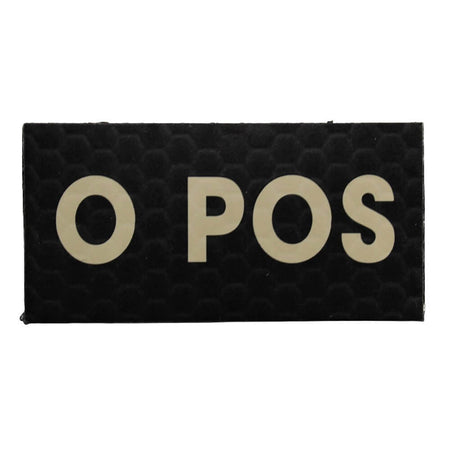 A rectangular black tactical patch with a subtle honeycomb texture, featuring the letters 'O POS' in a light tan or beige color, shown against a plain white background.