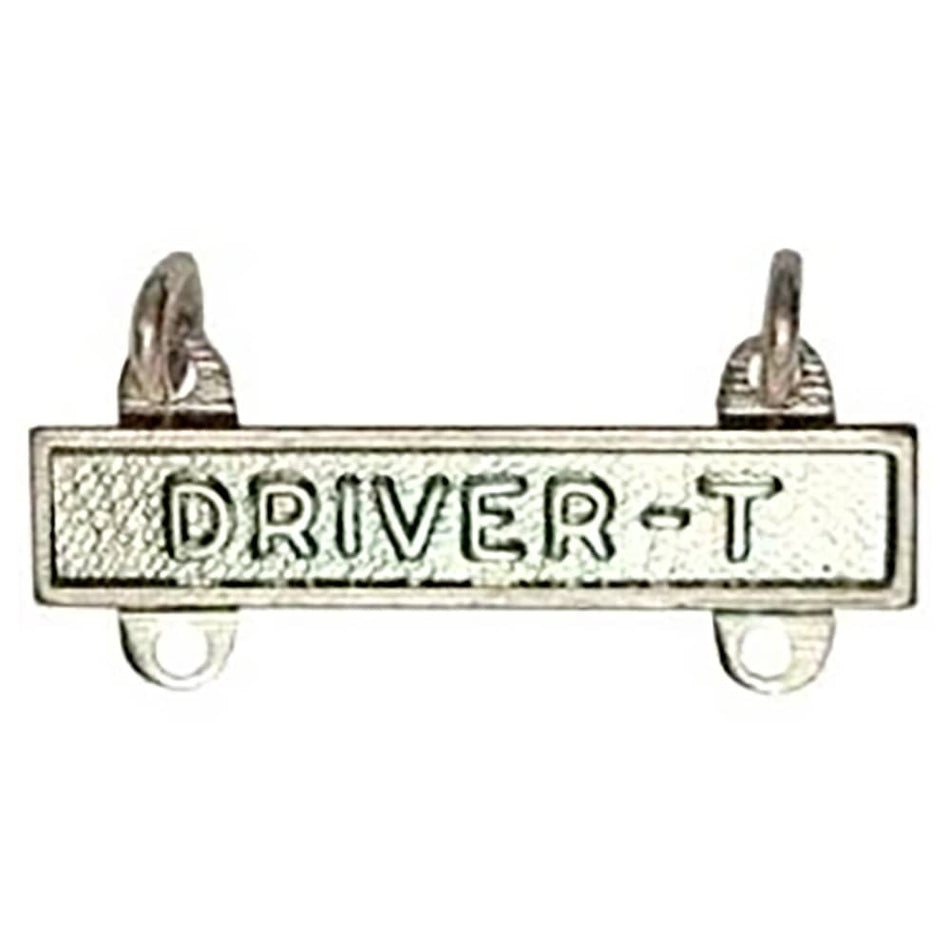 A silver-toned metal driver's license plate frame or emblem with the text 'DRIVER-T' on a plain white background.