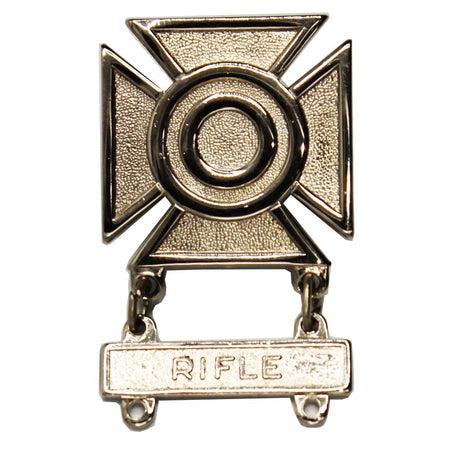 A metallic silver-toned Army Marksmanship Badges Weapons badge and a hanging bar engraved with the word 'RIFLE'.