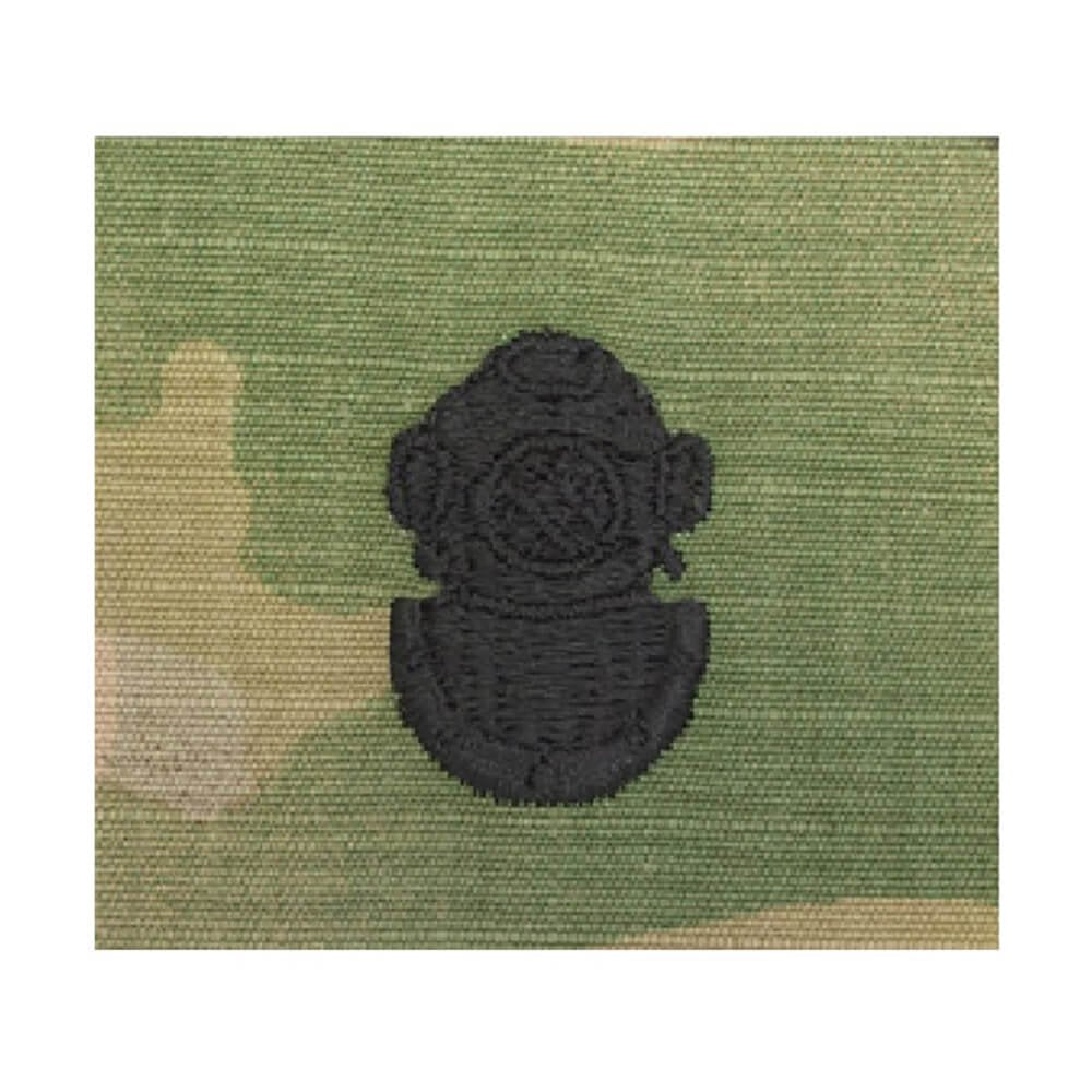 Army 2nd Class Diver OCP Sew-On Patch A black embroidered patch shaped like a vintage diving helmet, shown on a green camouflage fabric background.