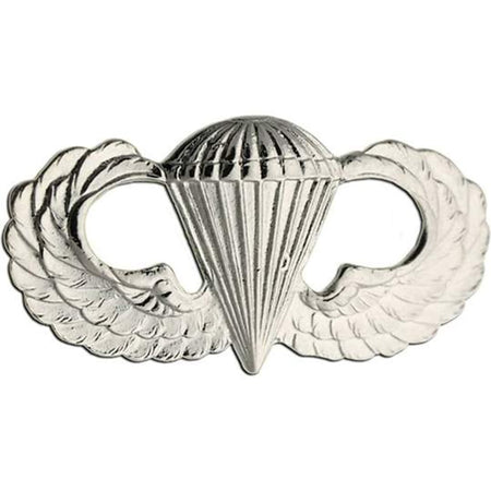 Army Basic Parachutist Badge a silver-colored metal insignia featuring a parachute in the center flanked by two wings, shown on a plain white background.