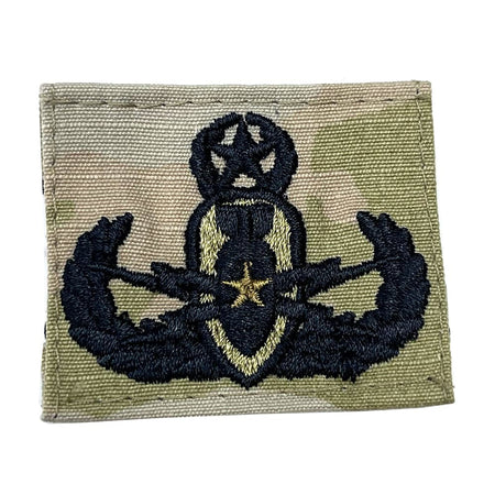 Army Master EOD Badge with military insignia on a beige background