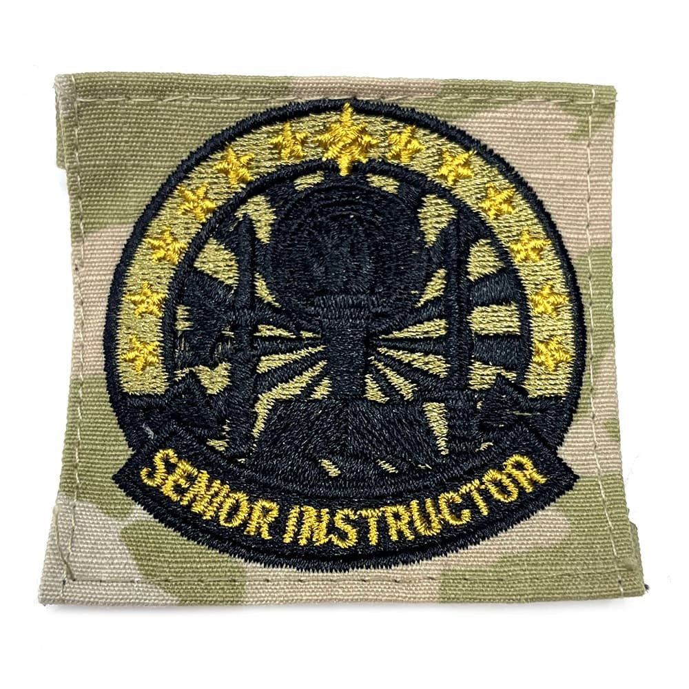 Patch with embroidered design and 'Senior Instructor' text on a green background