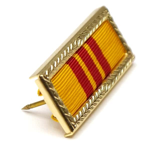 Gold military ribbon bar with red and yellow stripes on a white background