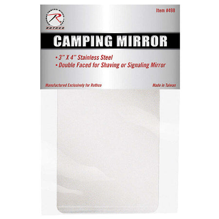 A packaged camping mirror with a silver header card and a clear plastic sleeve over a white backing. The header reads 'CAMPING MIRROR' with product details including '3" X 4" Stainless Steel' and 'Double Faced for Shaving or Signaling Mirror.