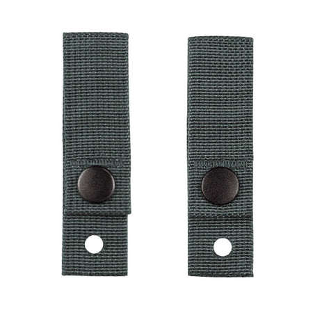 Two green webbed strap covers with black snap buttons and a hole, shown on a plain white background.
