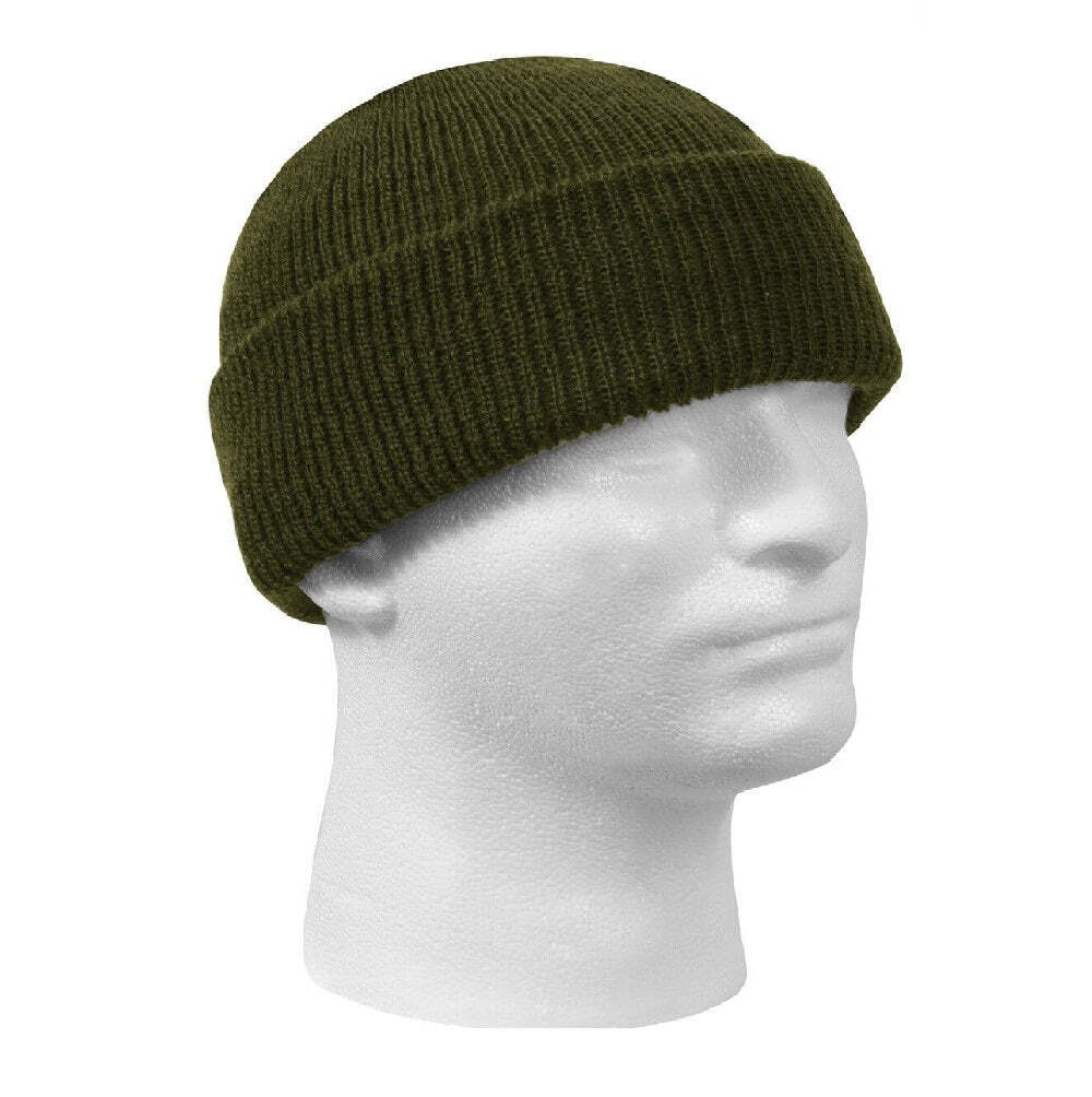 Green knit beanie on a mannequin head against a white background