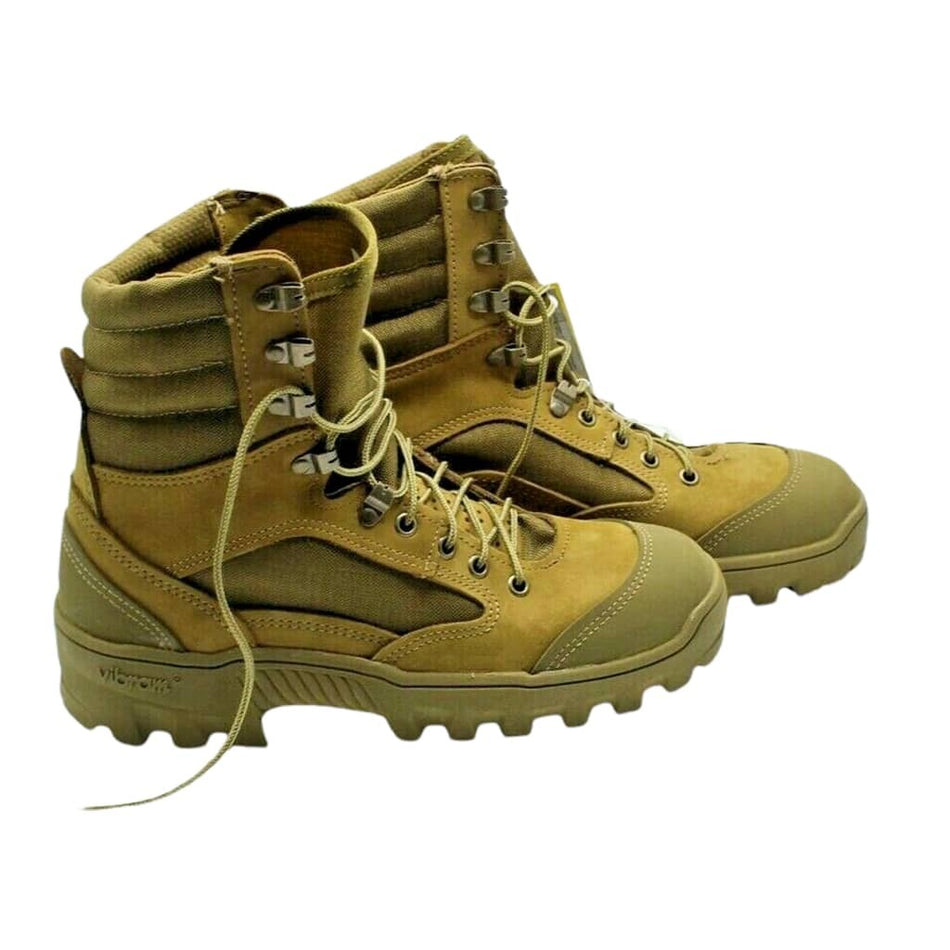 A pair of tan tactical combat boots with olive green accents, shown from a three-quarters angle on a plain white background.