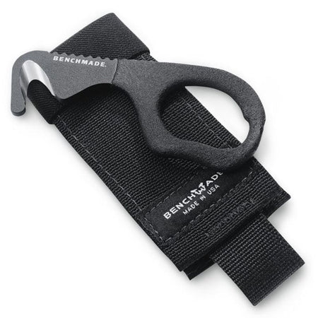 Benchmade Rescue Hook Strap Cutter on holster shown on a white background