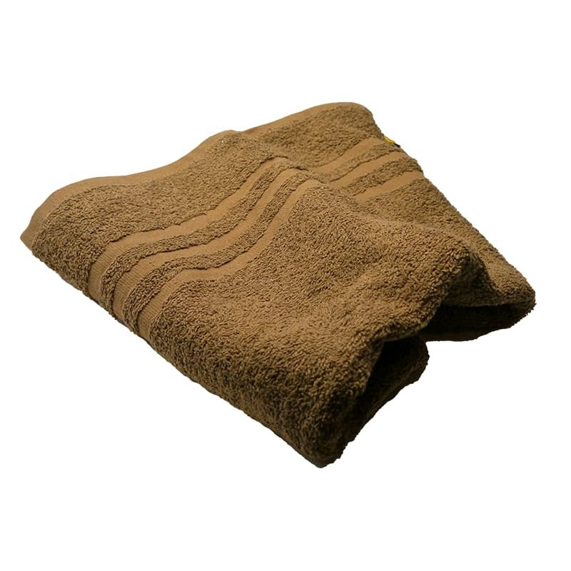 Brown towel with textured pattern on a white background