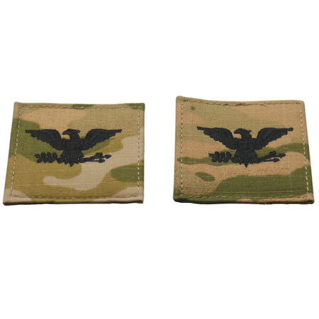 Two rectangular camouflage patches with a black double-headed eagle emblem, displayed side by side on a white background.