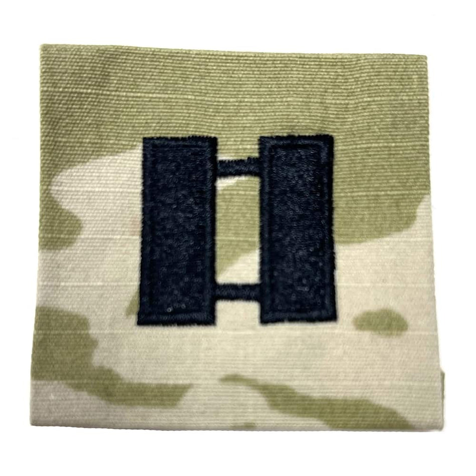 CPT Captain Army Rank Sew-On OCP Patch – flat lay of the black embroidered captain bars on OCP camouflage fabric