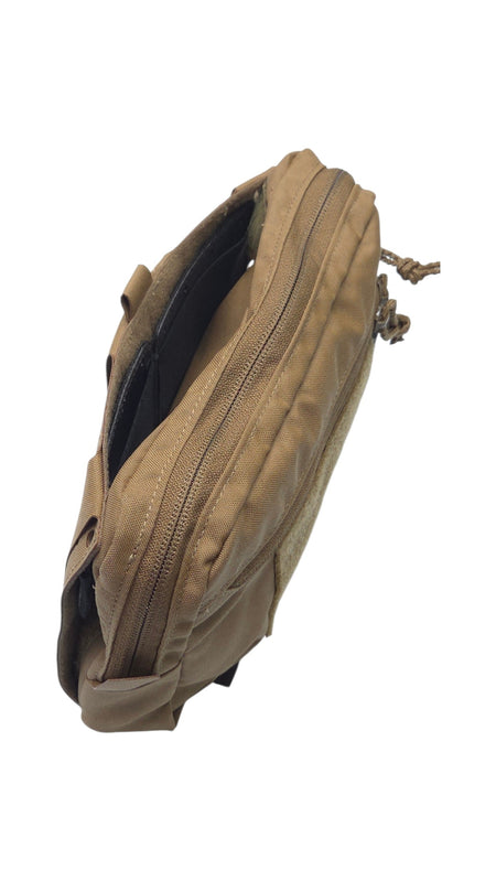 A tan canvas utility pouch with a diagonal zipper, shown open against a plain white background.