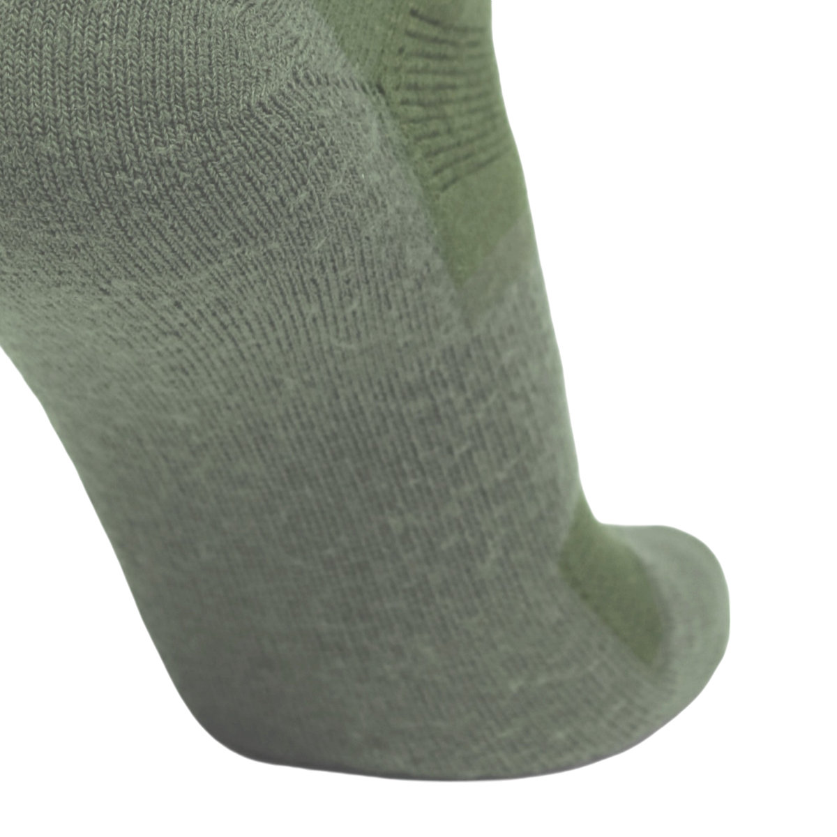 A close-up of a single knit sock in a muted sage green color, showing the textured fabric and toe area against a plain white background.