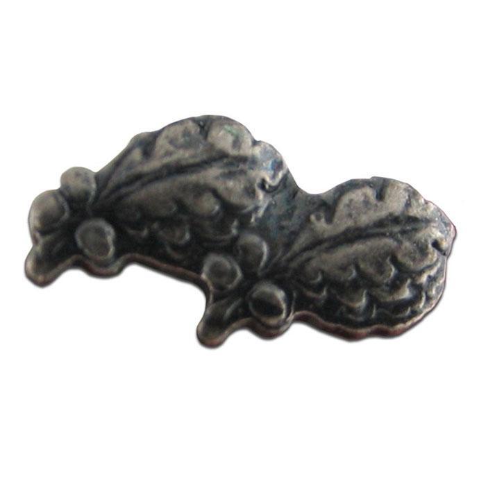 An antique-style pewter button with a detailed embossed floral and leaf pattern, shown on a plain white background.
