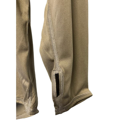 Closeup of thumb hole on the sleeve of a coyote brown Gen III Level 1 Lightweight Cold Weather Undershirt
