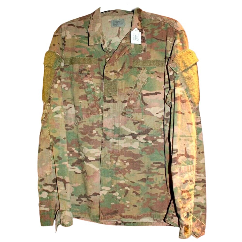 A military-style camouflage utility jacket with tan shoulder patches, shown flat against a white background.