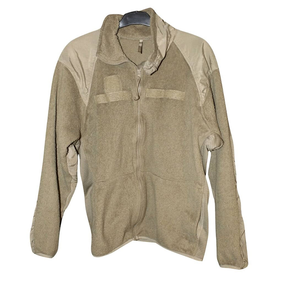 A military-style fleece jacket in a muted khaki/tan color, featuring a full zip front, a stand-up collar, and a high ribbed collar, displayed on a hanger against a white background.
