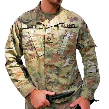 A man wearing a U.S. Army OCP Combat Uniform Jacket 