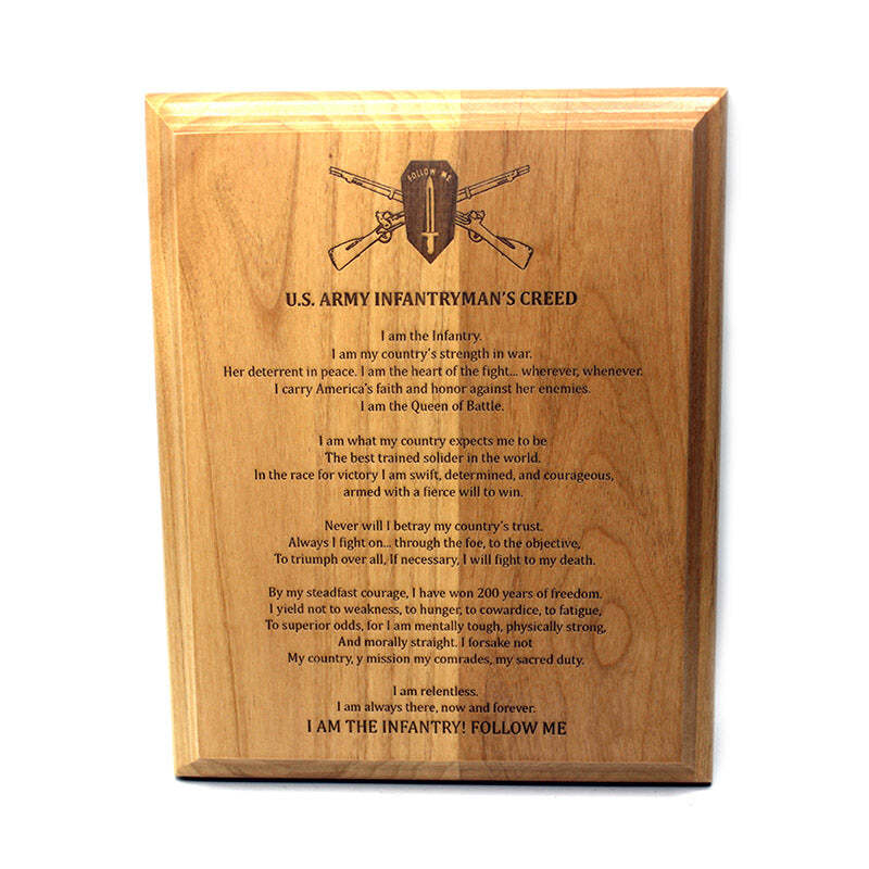 A rectangular wooden plaque with a warm honey-brown finish, featuring engraved text starting with 'U.S.
