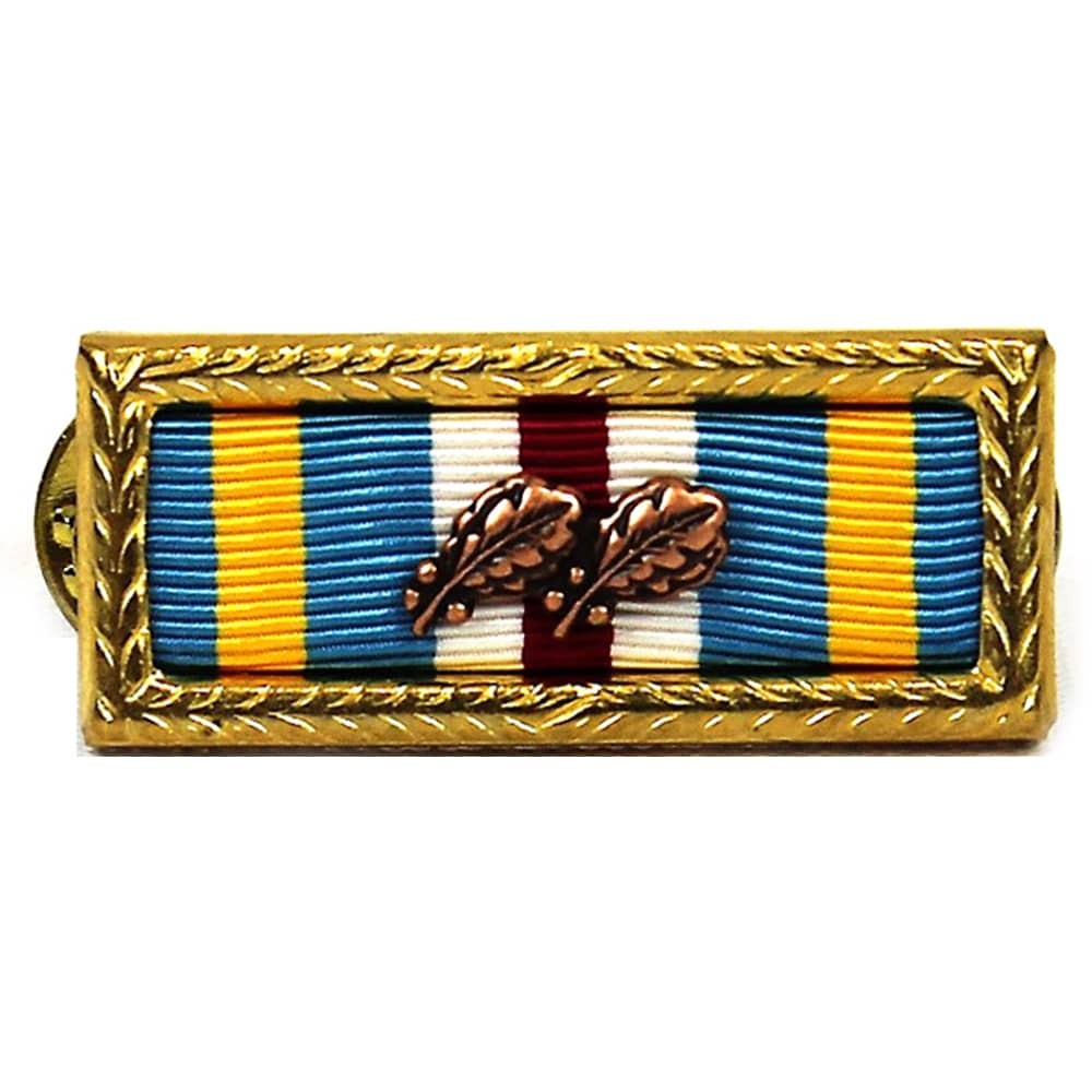 Joint Meritorious Unit Award Citation with Awards Assembled with a gold-toned border, featuring blue, yellow, white, and burgundy stripes with a central gold oak leaf emblem, shown on a plain white background.