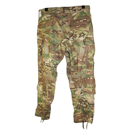 A pair of military cargo pants in a multicam camouflage pattern, featuring a mix of green, brown, tan, and beige tones. The pants are shown flat against a solid white background.