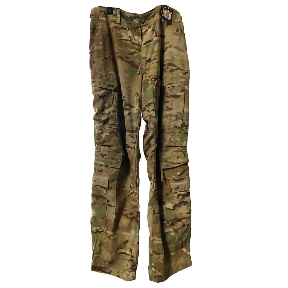 A pair of USGI Aircrew Combat Trousers in a Multicam camouflage pattern, featuring multiple utility pockets and a buttoned waist, shown against a plain white background.