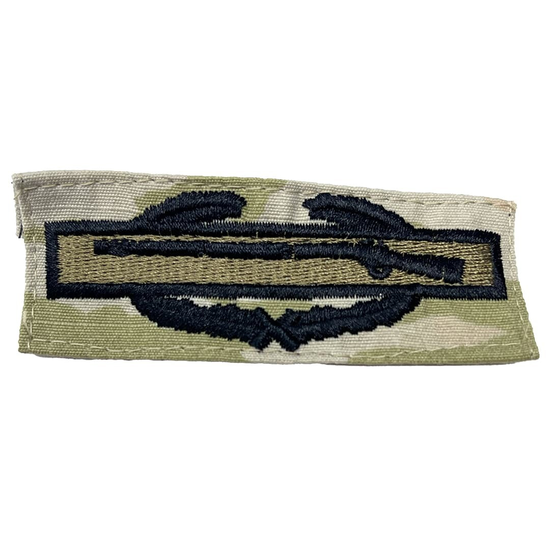 CIB patch featuring a rifle and wings design on a OCP background, isolated on a white background.