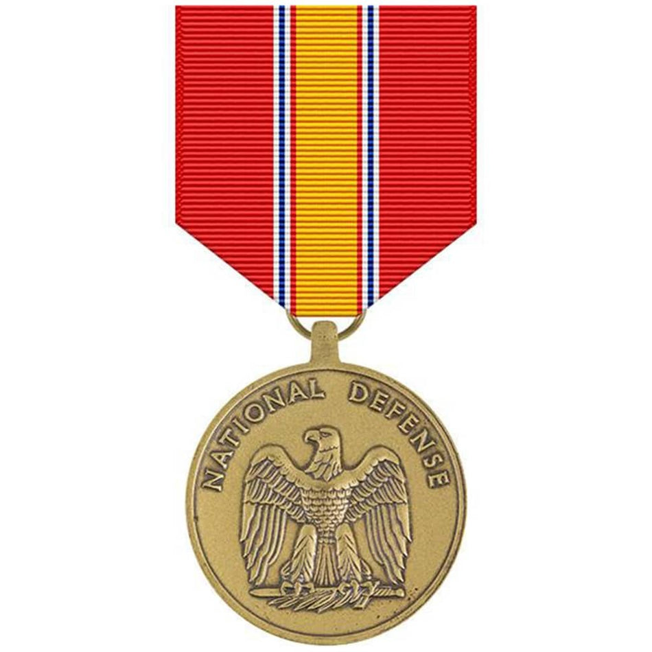 A National Defense Medal with a gold-toned medallion featuring an eagle design and the words 'NATIONAL DEFENSE,' suspended from a red ribbon with yellow and blue stripes, on a white background.
