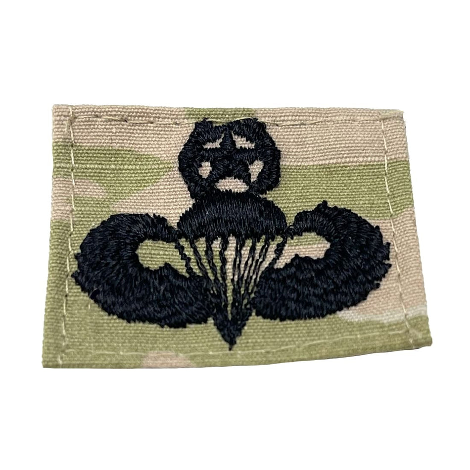 Army Master Parachutist Badge with black embroidered design on a white background