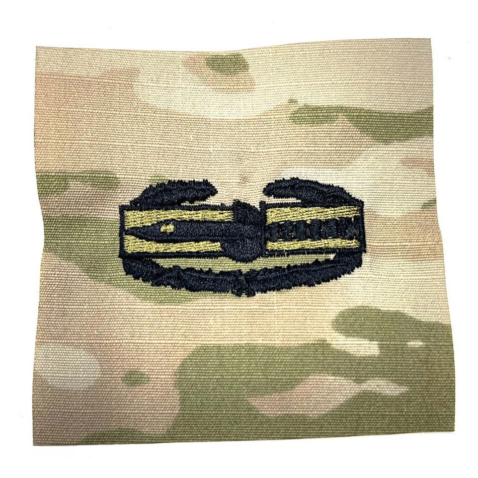 Combat Action Badge Army CAB 1st Award Sew-On OCP Patch with a black and gold emblem on a white background