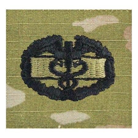 Embroidered badge on a camouflage background