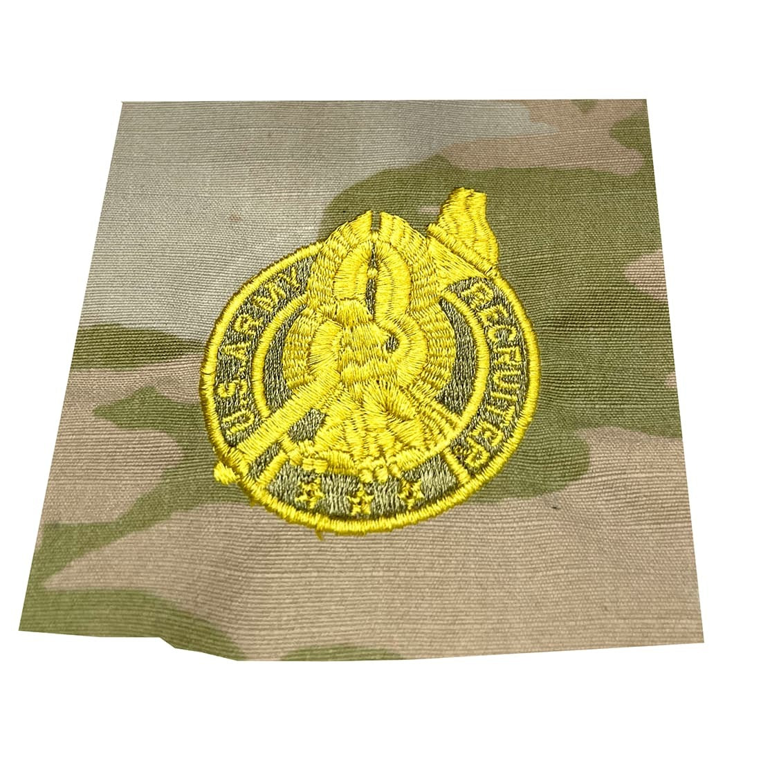 Senior Army Recruiter Badge Gold embroidered on a camouflage background