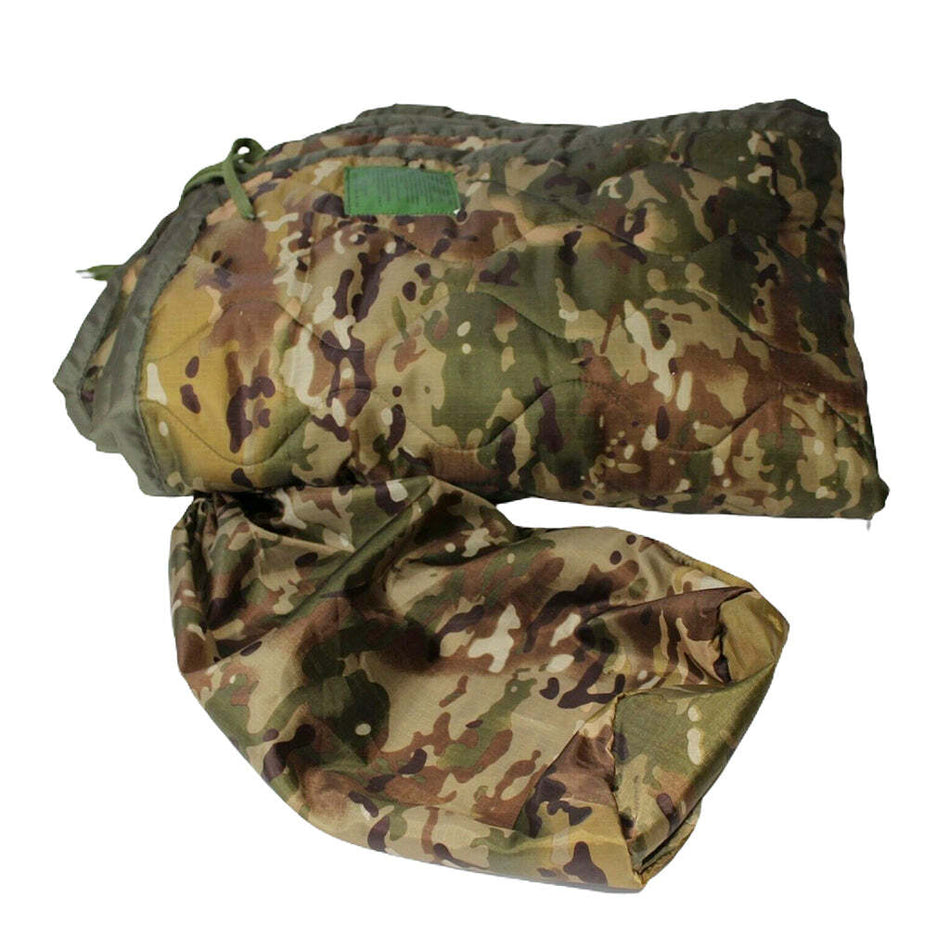 A camouflage military-style sleeping bag or padded bag shown on a plain white background, with a matching camouflage pouch placed in front.