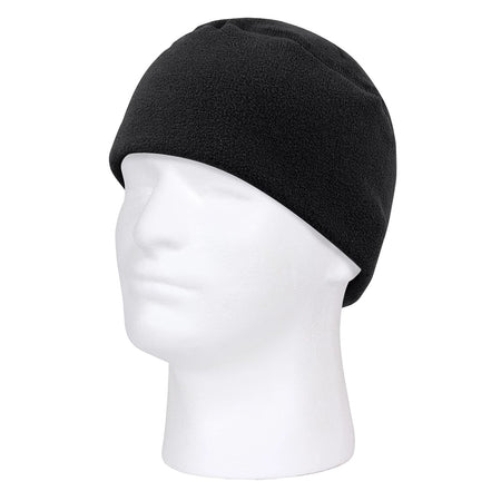 Black beanie on a white mannequin head against a white background