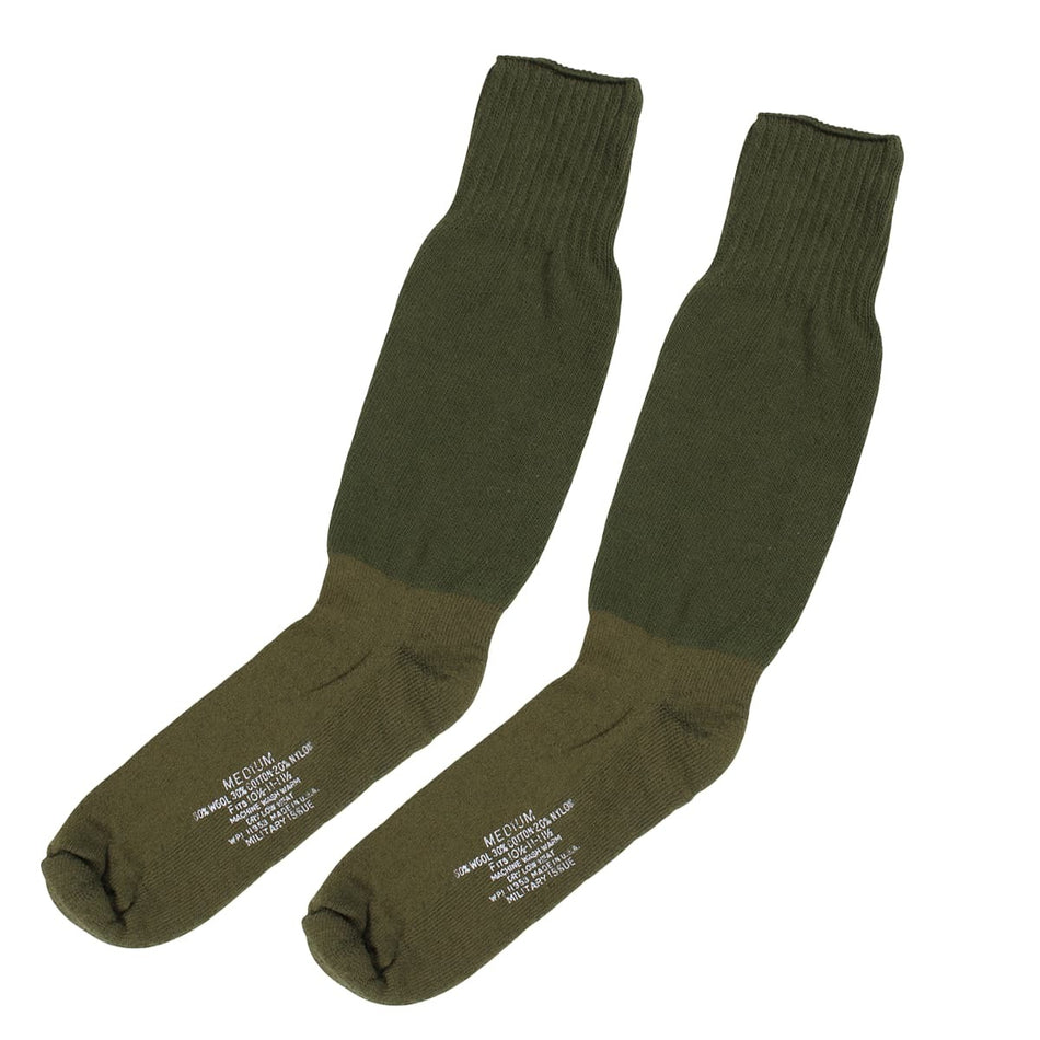 Pair of green socks on a white background