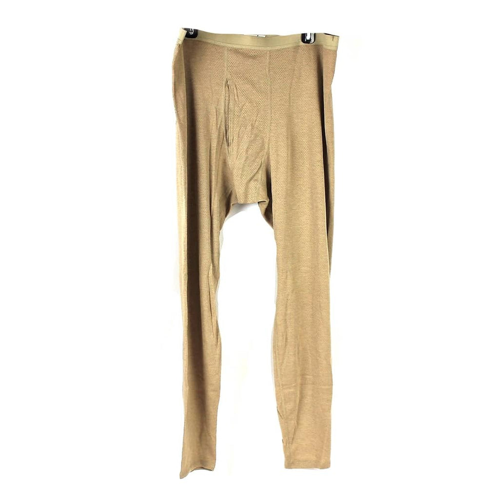 A pair of beige full-length compression leggings or hosiery pants hanging against a plain white background.