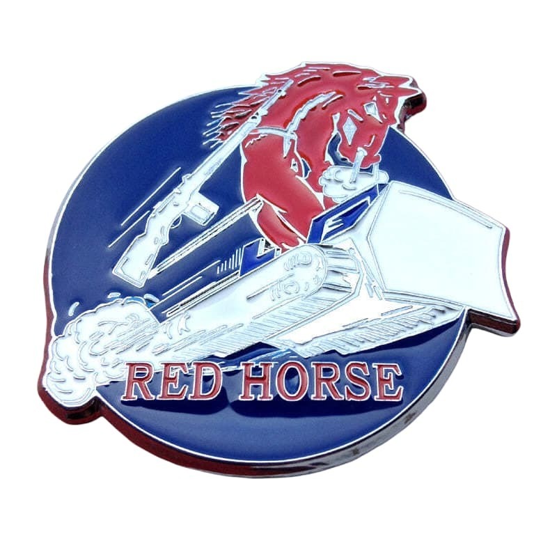 A circular enamel pin featuring a red horse rearing over a silver snowmobile, with the words 'RED HORSE' in red lettering on a dark blue background.